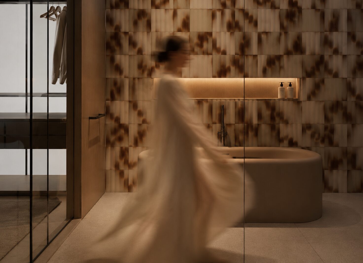 An Edite bathroom: tortoiseshell tiling and a sculpted stone basin